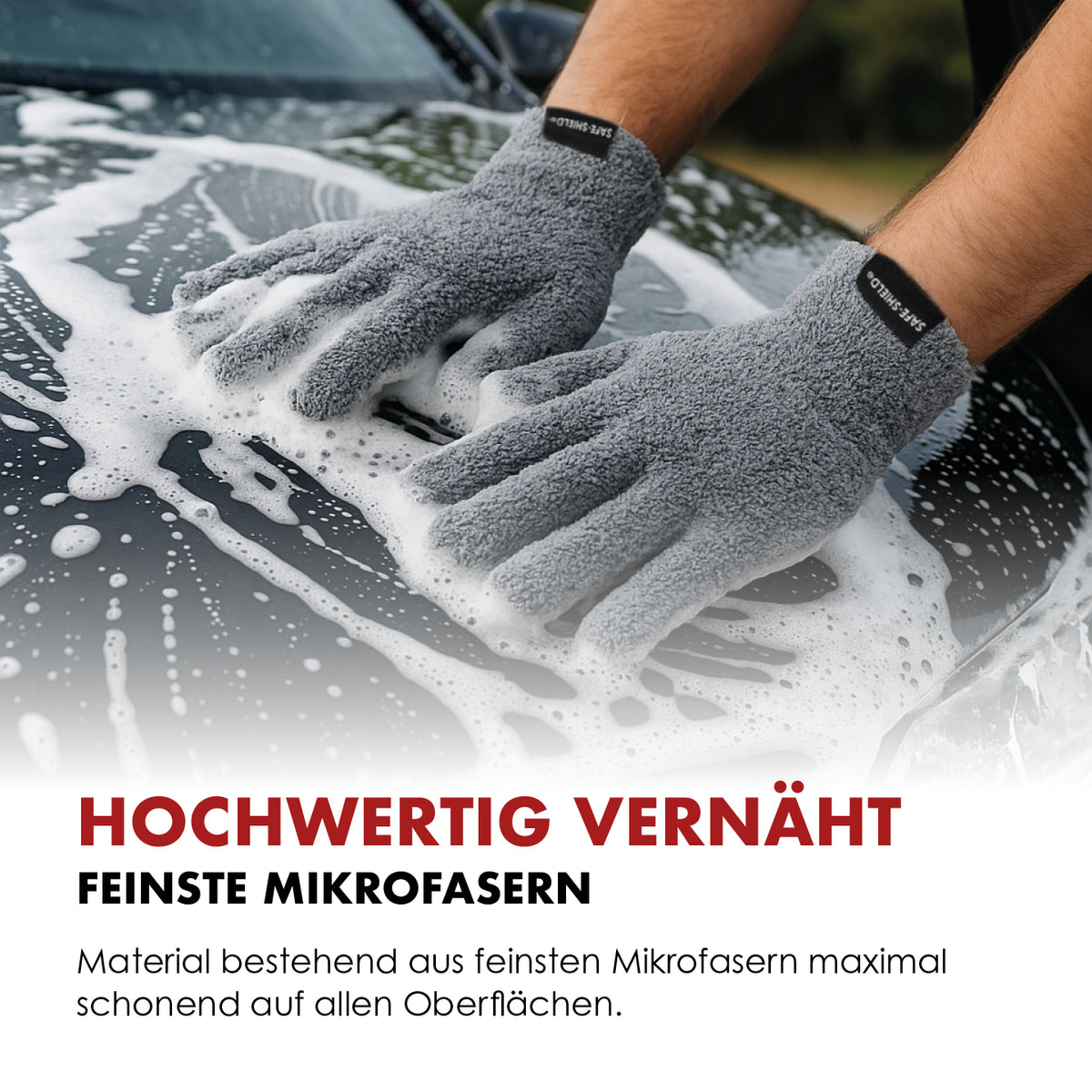Ein Paar FingerFit Waschhandschuhe bei der Handwäsche einer eingeschäumten Motorhaube